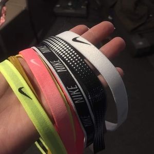 11 BRAND NEW Nike Headbands.
